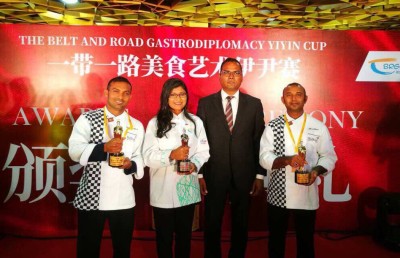 ޗައިނާގައި ބޭއްވި ކެއްކުމުގެ މުބާރާތަކުން ތިން ދިވެއްސަކު ރަން ވަނަތަކެއް ހޯދައިފި