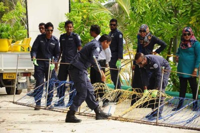 އޭދަފުށީގައި ހުރި އެމްޑީޕީގެ ޖަގަހައެއް ރޫޅާލުމުގެ މަސައްކަތް ފުލުހުން ފަށައިފި