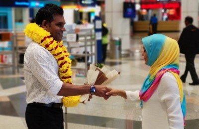 ފައިސަލް މެލޭޝިއާގައި ދިވެހިންނާއެކު