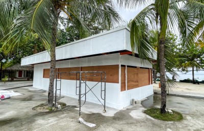 ޓަކް ޝޮޕެއް ހިންގަން އާޓިފިޝަލް ބީޗުން ބަޔަކަށް ބިން ދީފި