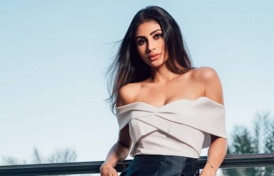 މޯނީ ރޯއި ދުބާއީގެ ވިޔަފާރިވެރިއަކާ ކައިވެނިކުރަނީ