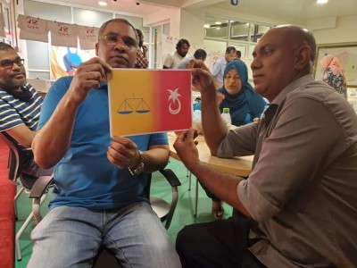 ޕީޕީއެމް އިން އެމްޑީޕީގެ ލޯގޯ ބޭނުންކުރާ މައްސަލަ ބަލައިދޭން އެދިއްޖެ